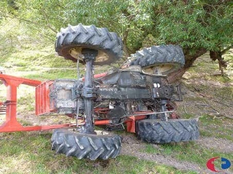 A SAME Explorer tractor on its side exposing the underneath